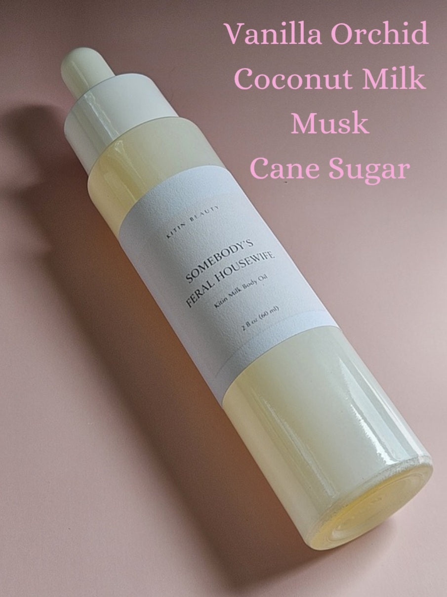 Kitin Milk Body Oil – Somebody’s Feral Housewife | Smells Like: Sugar Cane Coconut Milk, Vanilla Orchid Soft Musk | Vibe: Sweet Wild Soft but Unhinged