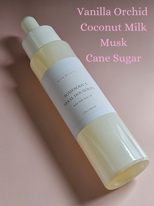 Kitin Milk Body Oil – Somebody’s Feral Housewife | Smells Like: Sugar Cane Coconut Milk, Vanilla Orchid Soft Musk | Vibe: Sweet Wild Soft but Unhinged