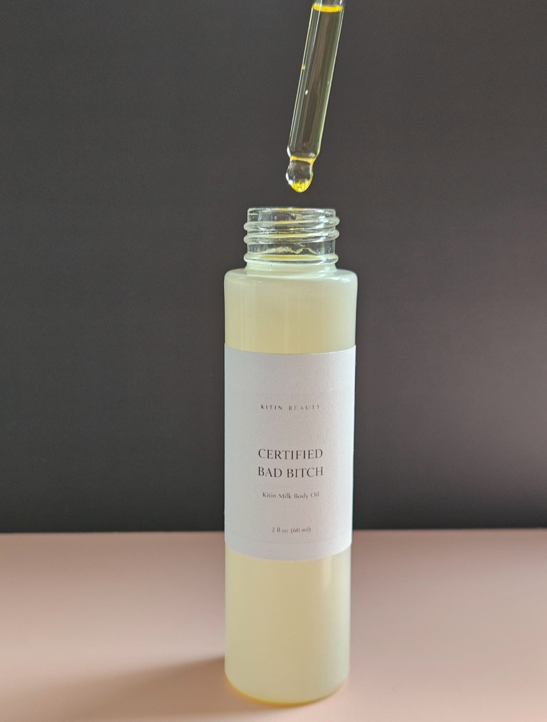 Kitin Milk Body Oil – Certified Bad Bitch | Smells Like: Pear Lychee, Gardenia Vanilla Amber | Vibe: Confident  Addictive That Girl Energy