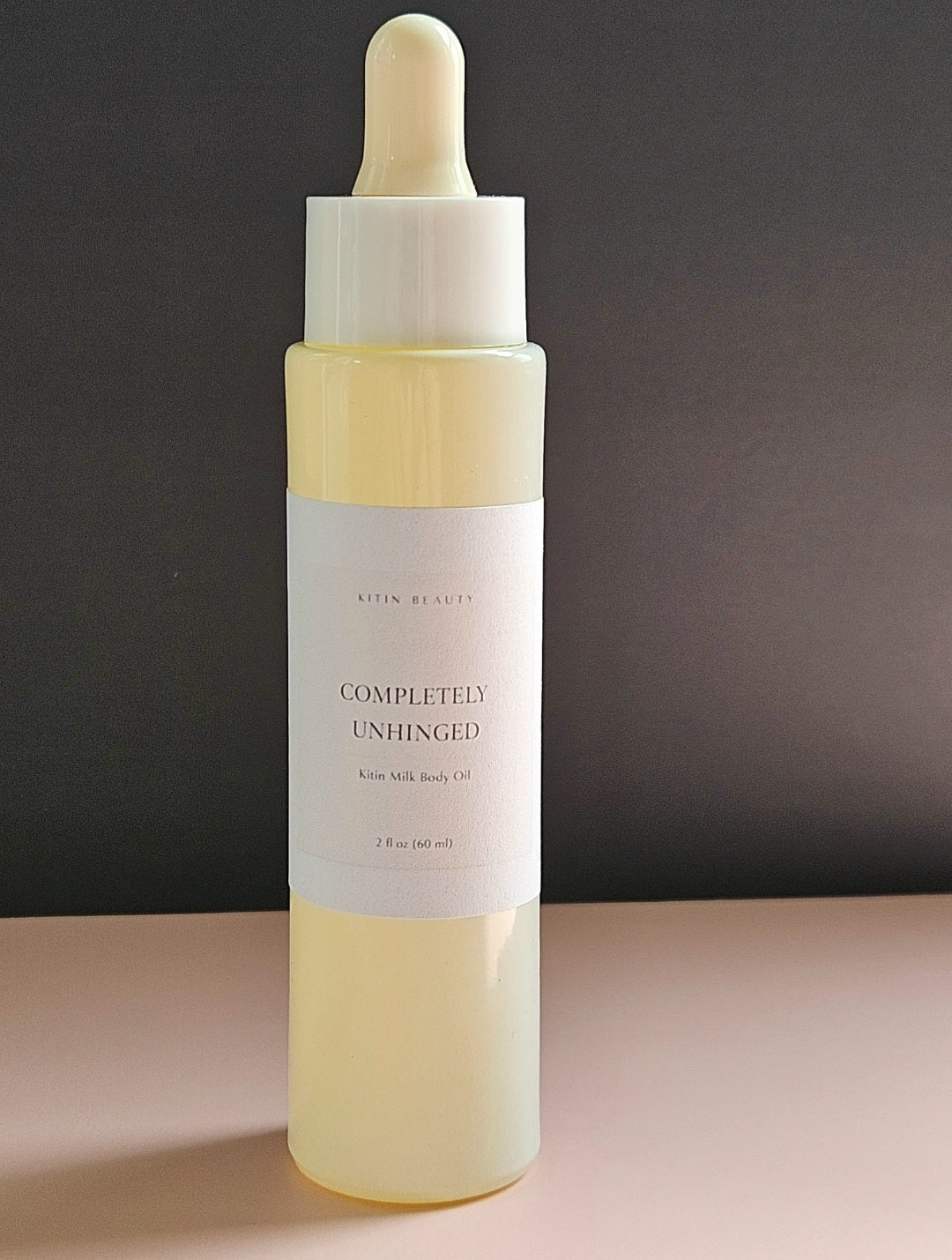 Kitin Milk Body Oil – Completely Unhinged | Smells Like: Buttercream, Toffee, Chocolate, Vanilla Cake | Vibe: Sweet, Chaotic, Can’t Be Controlled