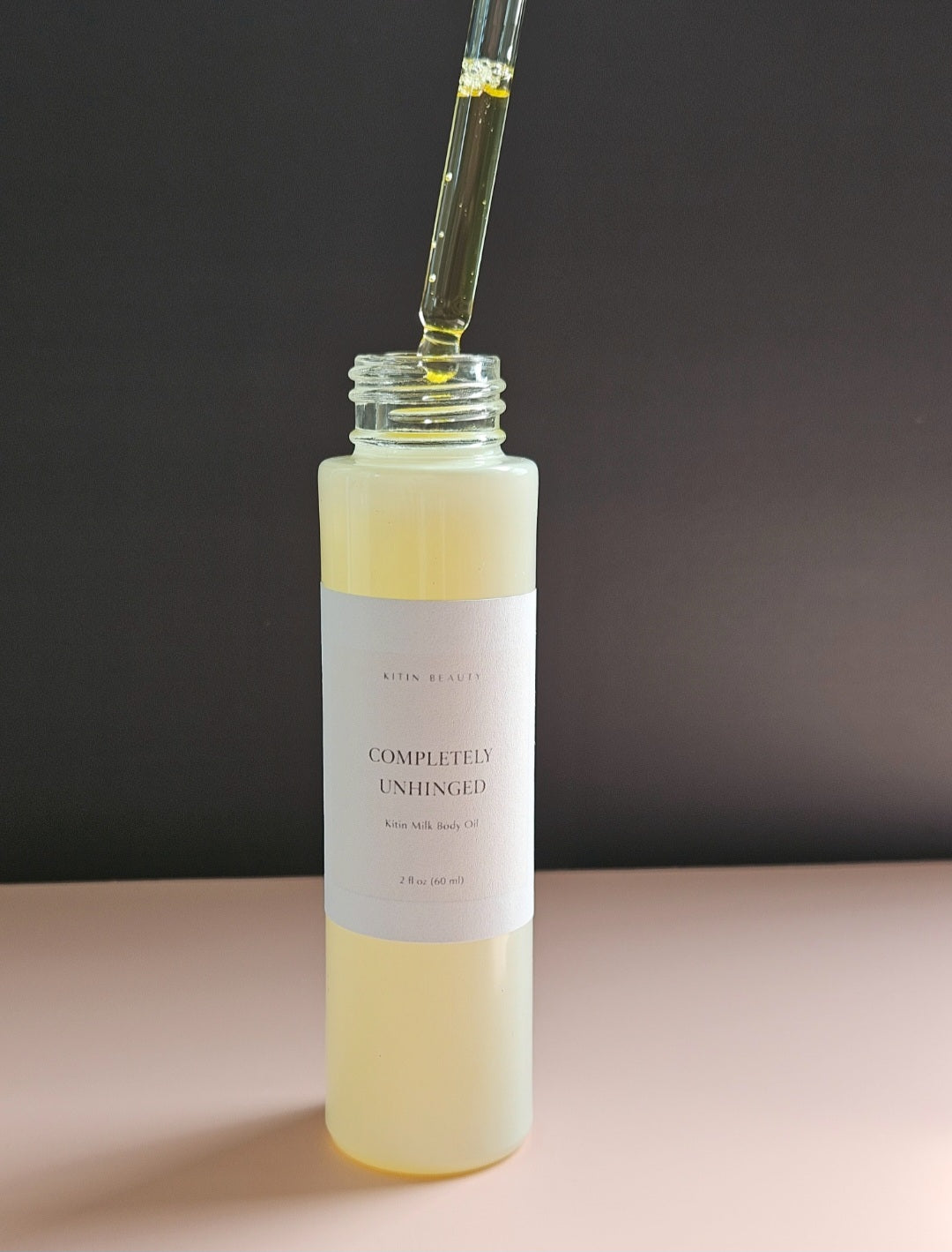 Kitin Milk Body Oil – Completely Unhinged | Smells Like: Buttercream, Toffee, Chocolate, Vanilla Cake | Vibe: Sweet, Chaotic, Can’t Be Controlled