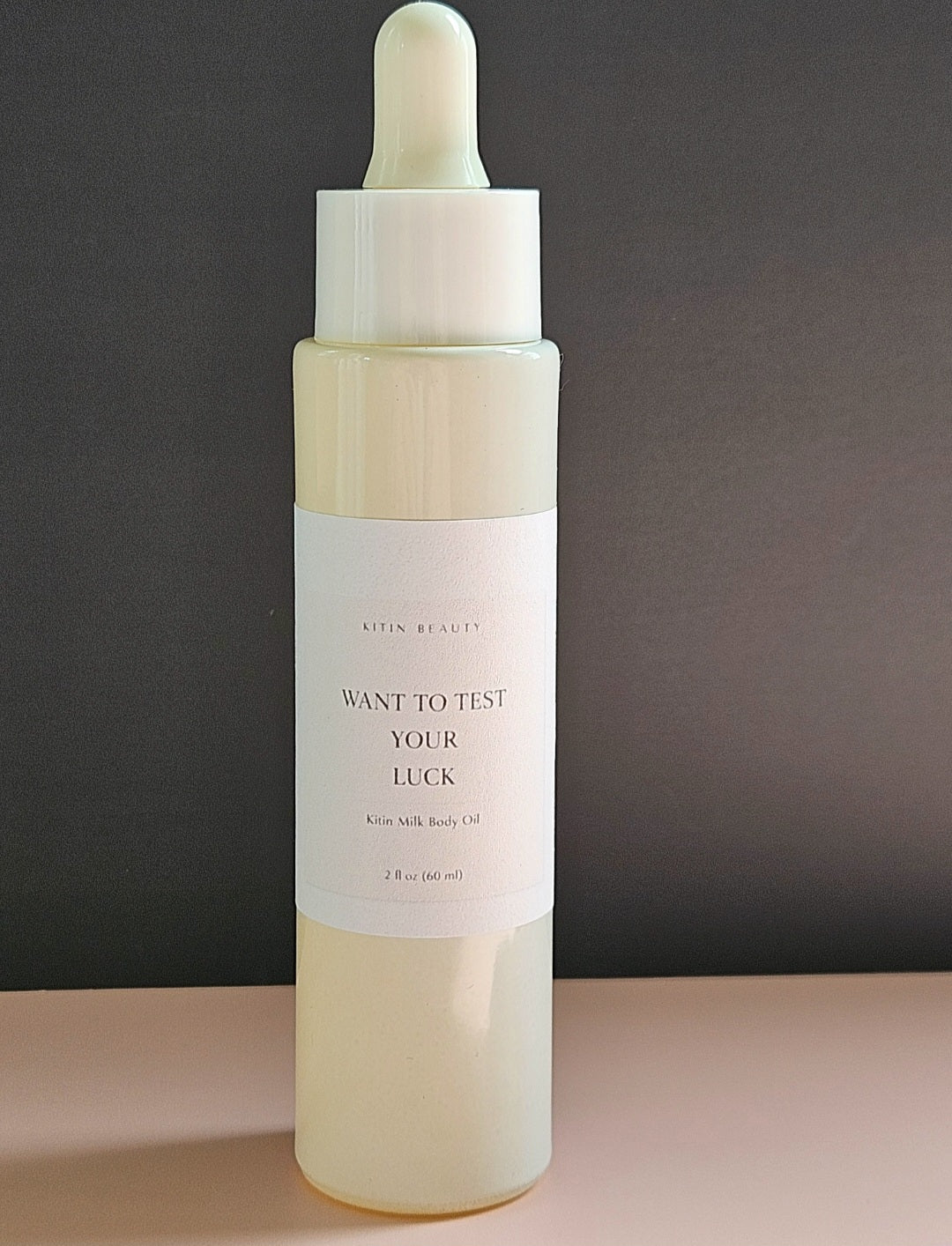 Kitin Milk Body Oil – Want to Test Your Luck | Smells Like: Juicy Pear Jasmine Orange Blossom, Coconut Caramel | Vibe: Playful Dangerous Hard to Forget