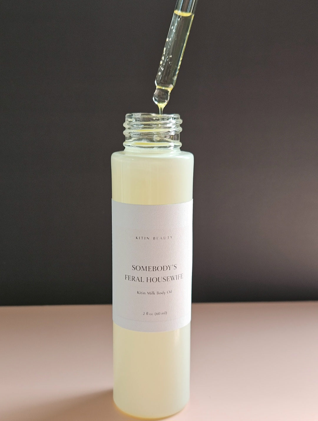 Kitin Milk Body Oil – Somebody’s Feral Housewife | Smells Like: Sugar Cane Coconut Milk, Vanilla Orchid Soft Musk | Vibe: Sweet Wild Soft but Unhinged