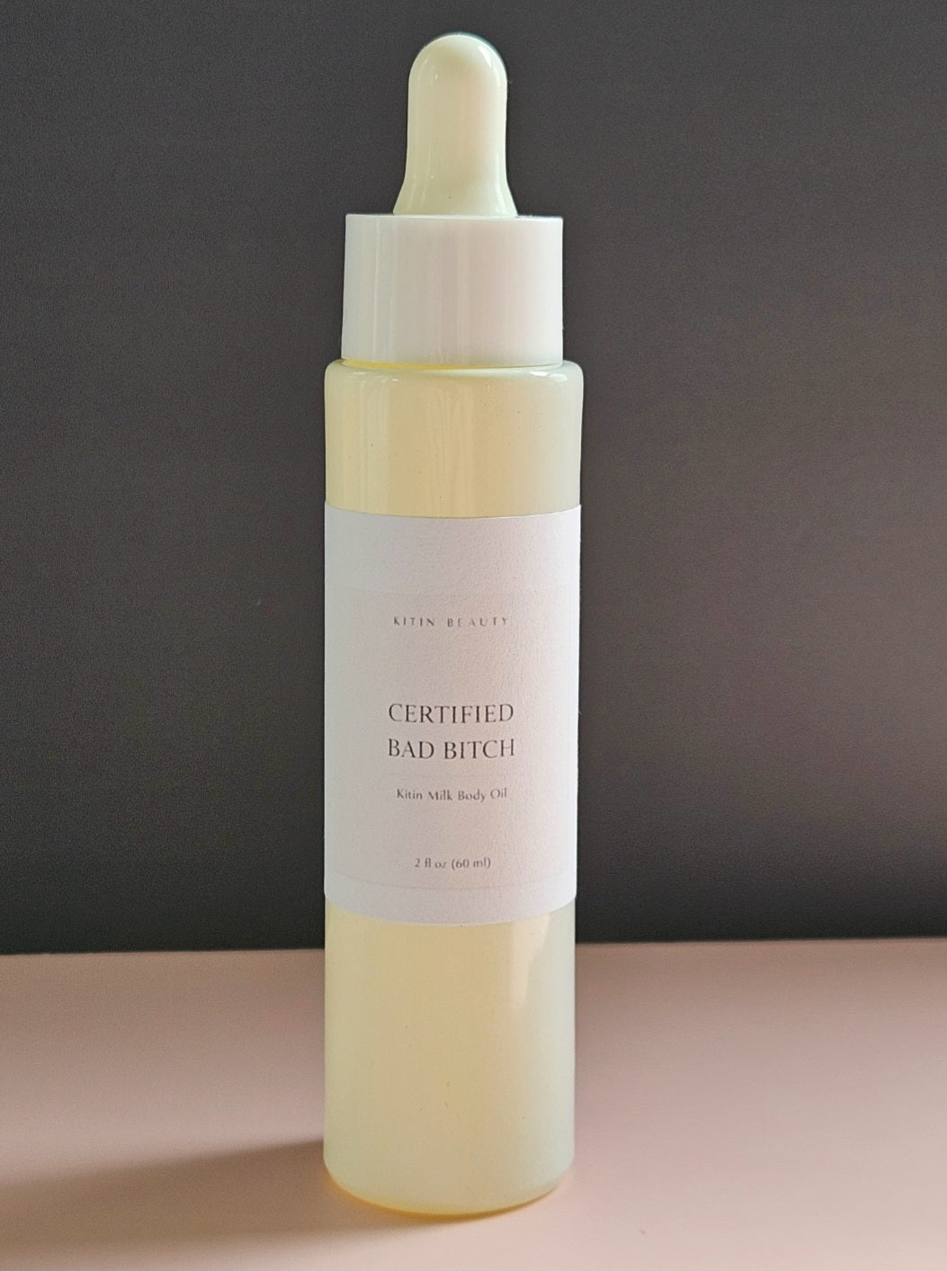 Kitin Milk Body Oil – Certified Bad Bitch | Smells Like: Pear Lychee, Gardenia Vanilla Amber | Vibe: Confident  Addictive That Girl Energy