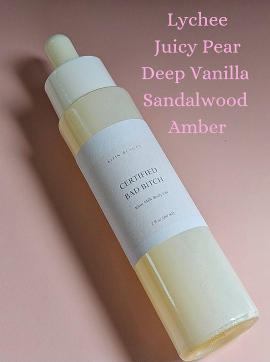Kitin Milk Body Oil – Certified Bad Bitch | Smells Like: Pear Lychee, Gardenia Vanilla Amber | Vibe: Confident  Addictive That Girl Energy