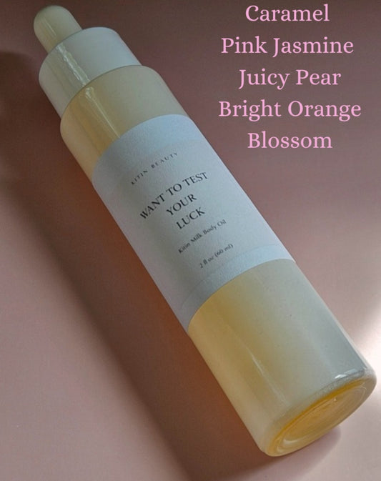 Kitin Milk Body Oil – Want to Test Your Luck | Smells Like: Juicy Pear Jasmine Orange Blossom, Coconut Caramel | Vibe: Playful Dangerous Hard to Forget