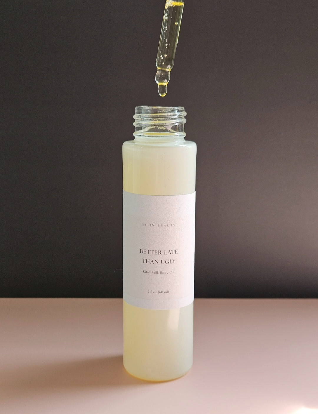 Kitin Milk Body Oil – Better Late Than Ugly | Smells Like: Pear Nectar Pink Orchid Sandalwood Soft Amber | Vibe: Pretty Polished Effortlessly Put Together